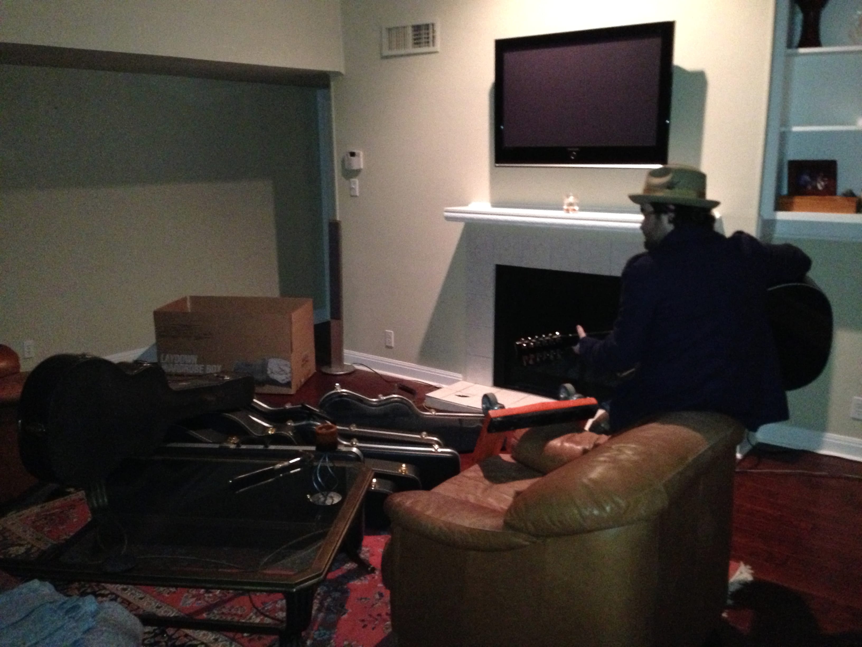 A person seated in a domestic music room in Austin on New Year's Day 2013.