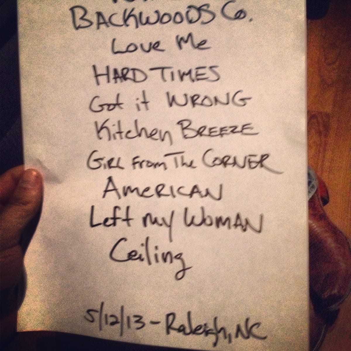 Close view of a handwritten Wild Feathers set list dated May 12, 2013, Raleigh, North Carolina.